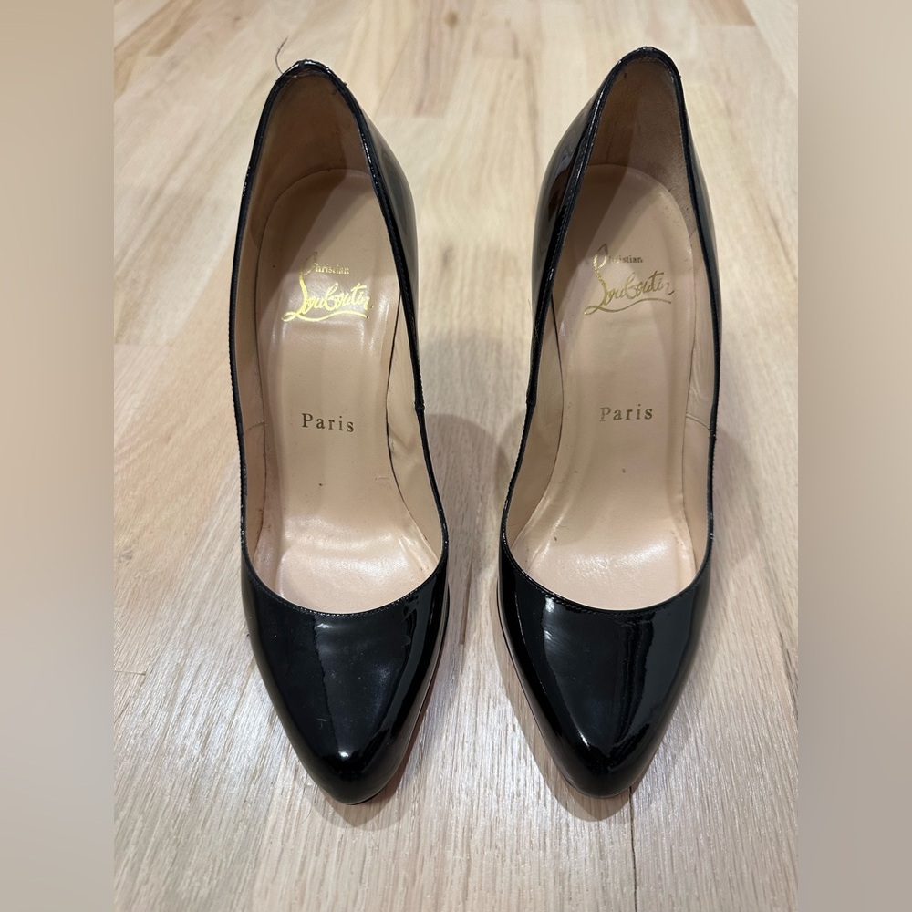 Christian Louboutin black patent Decolette 100, size 36. Great shape.